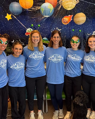 Coastal Pediatric Therapies team in matching shirts